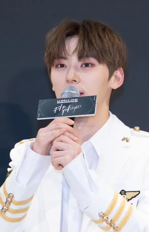 Wanna One's Hwang Min Hyun Talks About Revealing His Abs During